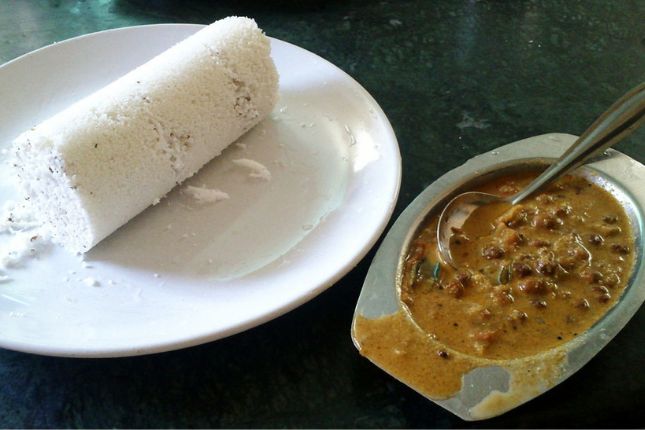 Puttu and Kadala Curry - Must Try Kerala Cuisines During Your Kerala Tour Packages