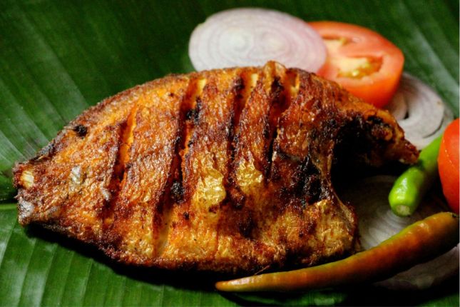 Karimeen Pollichathu - Must Try Kerala Cuisines During Your Kerala Tour Packages | Paradise Holidays