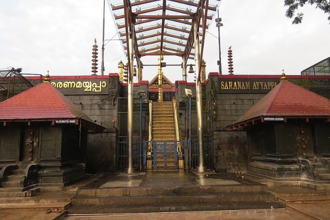 Devotees trekking to Sabarimala Temple – Spiritual places in Kerala